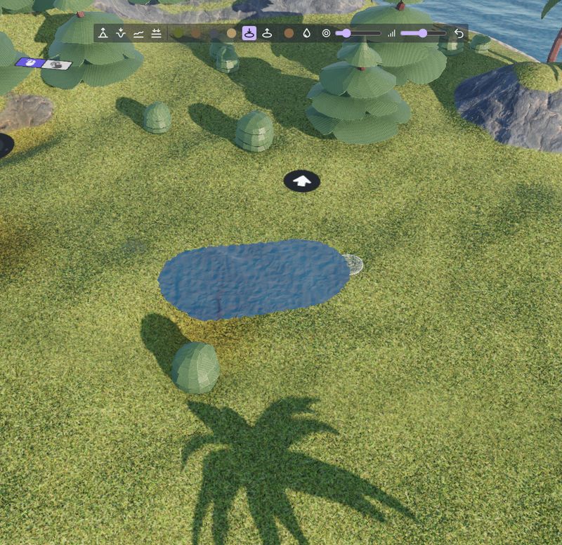 The "Make a hole" brush, over a hole in a meadow